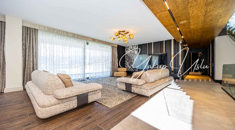 Modern spacious living room with open kitchen Kargicak villa Alanya Master bedroom en-suite bathroom luxury villa Kargicak Alanya