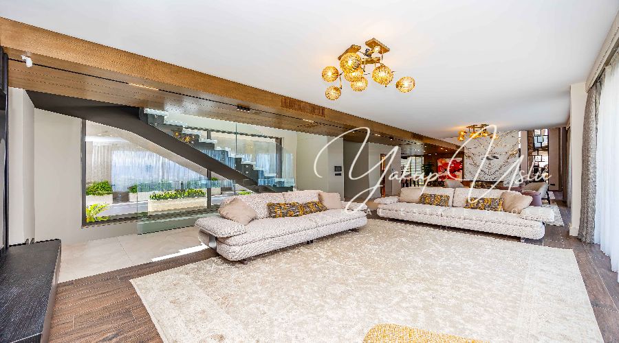 Modern spacious living room with open kitchen Kargicak villa Alanya Master bedroom en-suite bathroom luxury villa Kargicak Alanya