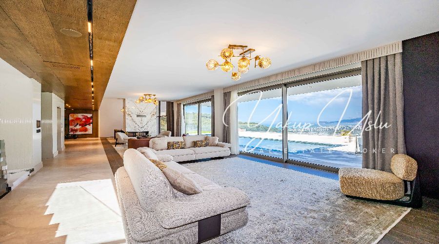 Modern spacious living room with open kitchen Kargicak villa Alanya Master bedroom en-suite bathroom luxury villa Kargicak Alanya