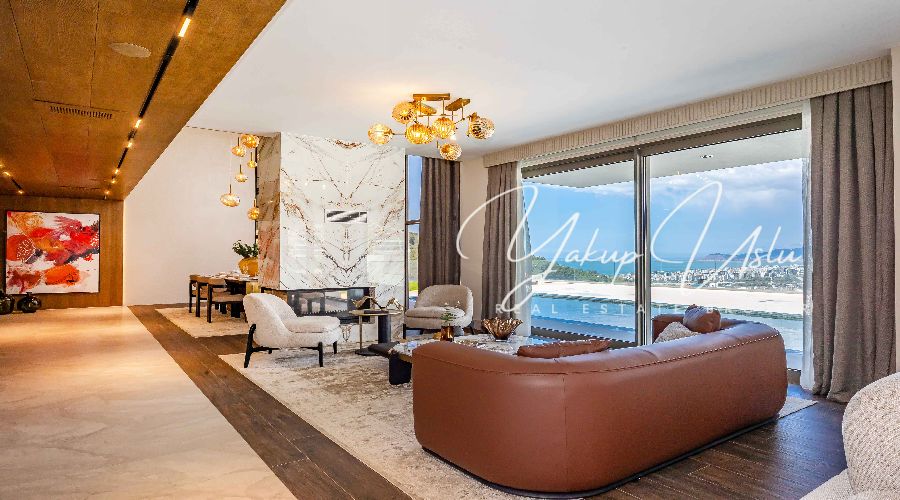 Modern spacious living room with open kitchen Kargicak villa Alanya Master bedroom en-suite bathroom luxury villa Kargicak Alanya